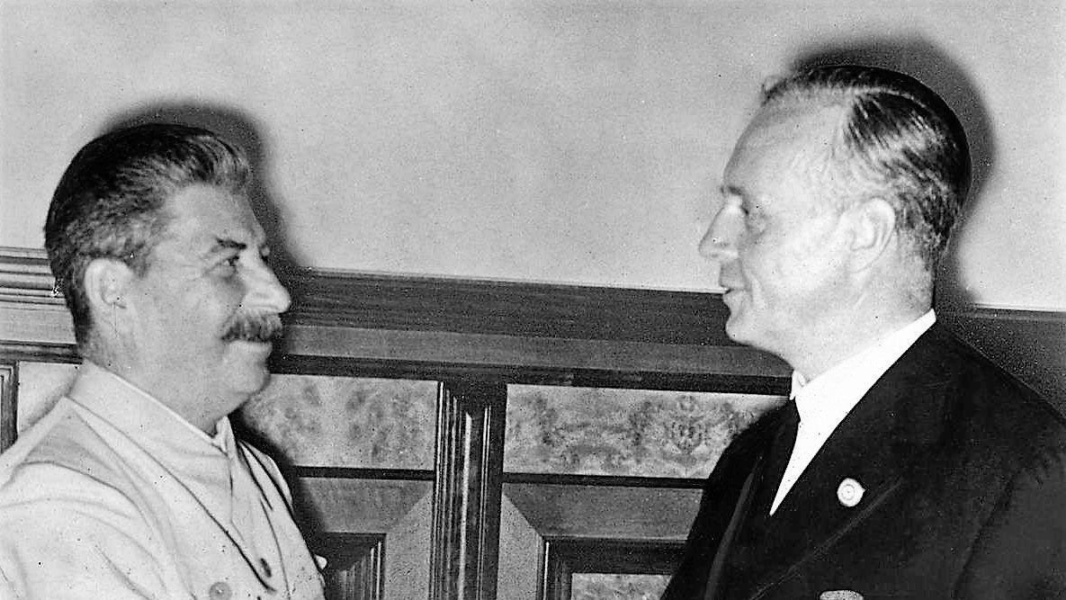 Joseph Stalin shaking hands with German Foreign Minister Joachim von Ribbentrop in the Kremlin after the signing of the Molotov-Ribbentrop Pact, Moscow, 23 August 1939