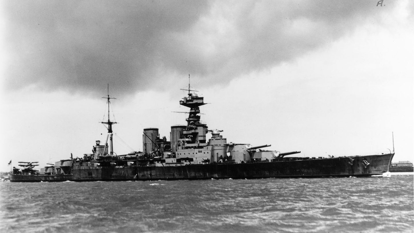 The British battlecruiser HMS Hood underway at sea in 1931, fitted with an aircraft catapult on her aft deck