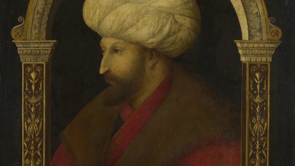 Gentile Bellini's 1480 portrait of Sultan Mehmed II, painted from life two years before the artist's death, showing the sultan in profile beneath an arch flanked by ornamental crowns