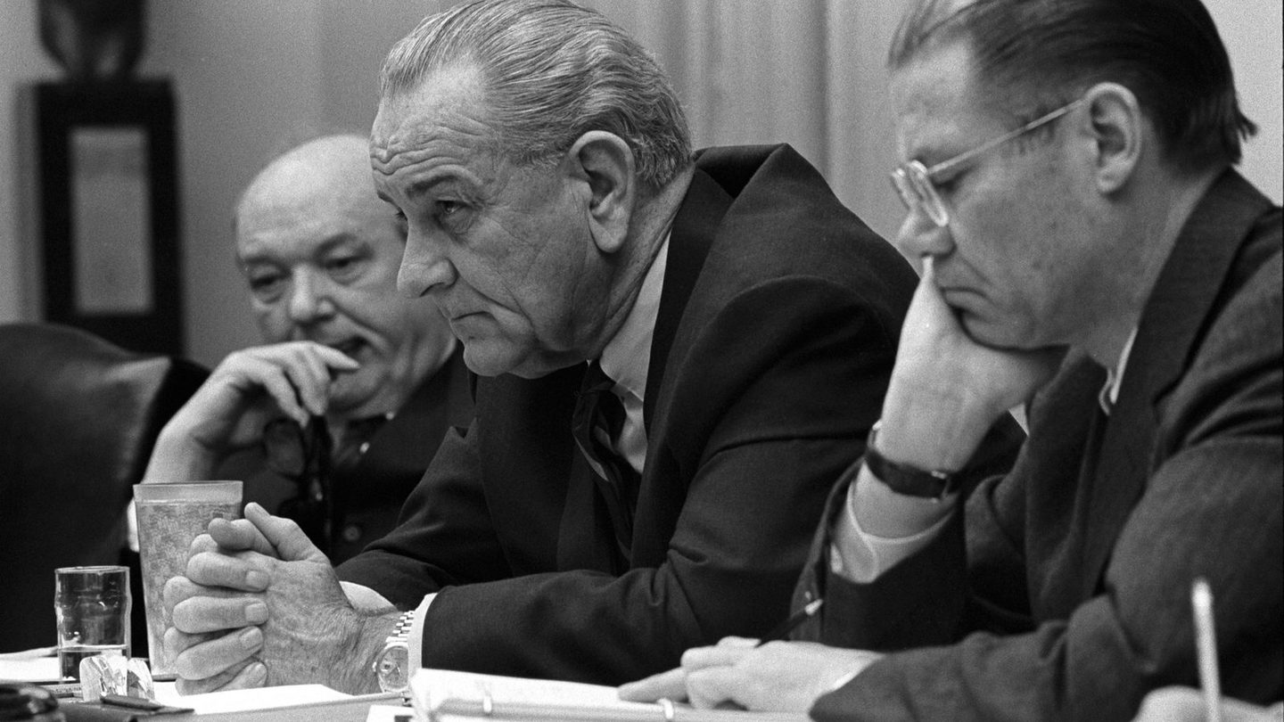 Secretary of State Dean Rusk, President Lyndon B. Johnson, and Secretary of Defense Robert McNamara meeting in the White House Cabinet Room, February 1968